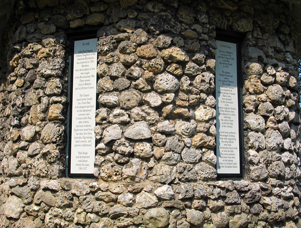 coral_hut2 The shed is in a corner of John Paul Park, which was founded more than 100 years ago. It was built as a tool shed; the panels describe the history of the town and the park (but, intriguingly, they don't seem to mention the corals).