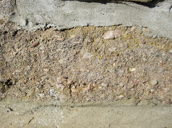 A very "dirty sandstone" containing abundant rock fragments and a mixture of minerals.