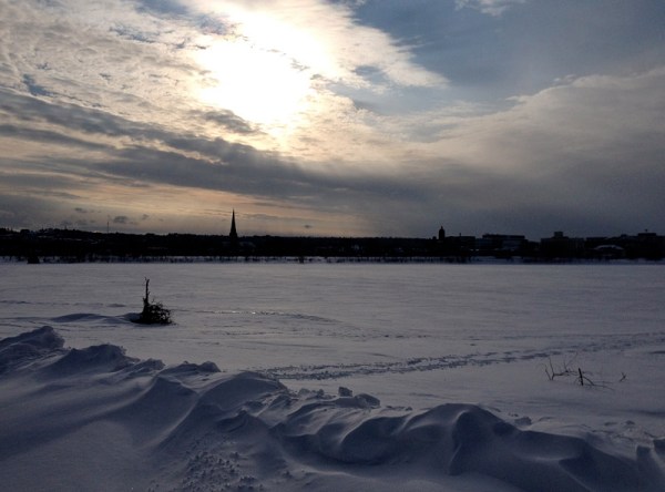 New Brunswick's Saint John River changes dramatically from season to season. In Fredericton in the dead of winter, it is a sahara of snow . . .