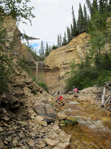 Geologists examine Upper Ordovician strata at Surprise Creek, a tributary of the Churchill River.